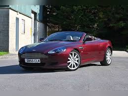 Image result for Amethyst Red 2011 Aston Martin
