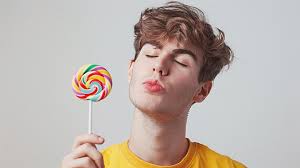 A Young Boy Holding Lollipop With Mischievous, Model, Person, Reaction PNG  Transparent Image and Clipart for Free Download