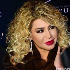 بالصور نوال الزغبي تستقبل 2015 بإطلالة متألقة وجذابة