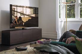 It's made from engineered wood and rests on a white, finished sled base. The Best Tvs In 2021 Whatever Your Budget