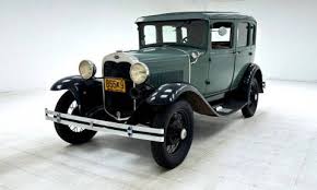 Image result for Scaraba Green 1930 Oldsmobile