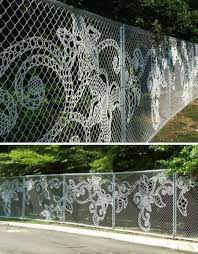 More often than not, any type of wood fence will cost more than a chain link fence. 6 Decorated Chain Link Fences Fence Art Fence Weaving Backyard Fences