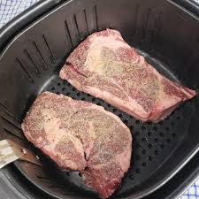 Cover the steaks with a light coat of oil. Air Fryer Rib Eye Steak With Blue Cheese Butter This Old Gal