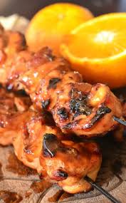 Juicy Tender Flavorful Chicken Thigh Kebabs Made On A Grill With A Sweet And Spicy Orange Sauce These Orange Chicken Keb Chicken Kebabs Skewer Recipes Kebab