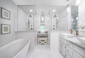 Natural light illuminates this modern bathroom creating an energizing environment that s sure to help on monday. 12 Beautiful Marble Bathrooms The Scout Guide