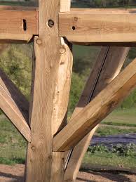 An Example Of Some Of Our Jointing On A Round Pole Timber Frame Barn See More Of Our Work Timber Frame Building Timber Frame Construction Timber Frame Joinery