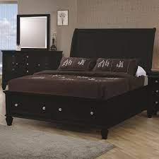 .storage bed in white constructed from tropical hardwoods sleigh style headboard storage drawers in footboard sophisticated paneled details white finish dovetail drawers with full extension glides felt lined top drawers this bedroom set includes: Coaster Sandy Beach Queen Sleigh Bed With Footboard Storage Value City Furniture Sleigh Beds