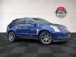 Image result for Glacier Blue 2013 SRX