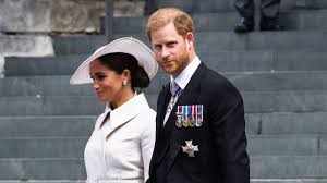 King Charles III and Prince Harry and Meghan Markle during a royal event
