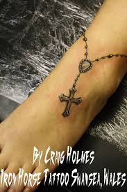 Foot tattoos can be anything from small patterns like animals, stars, flowers to something with a profound meaning. Rose Rosary Tattoo On Foot