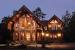 Winter Log Cabin In The Woods