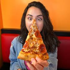 Can't beat that first slice feeling 🍕👀