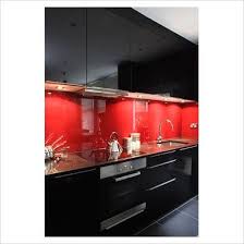 Black Appliances Red Cabinets Gap Interiors Modern Black Kitchen Picture Library Specialising In Modern Black Kitchen Red Kitchen Red Kitchen Cabinets