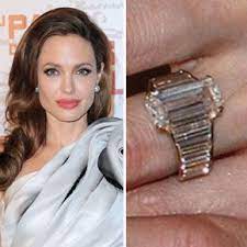 Angelina Jolie S Engagement Ring Was Designed By Brad Pitt Along With Jeweler Robert Famous Engagement Rings Celebrity Wedding Rings Celebrity Engagement Rings