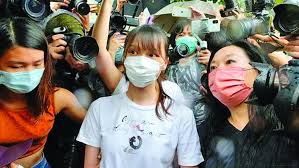 Chow sits in a van after being arrested at her home under the national security law in hong kong photo: Dnkxcwghzas72m