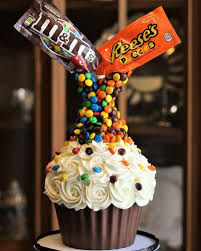 Gravity Defying Giant Cupcake M M S Reeses Pieces Giant Cupcake Cakes Giant Cupcake Recipes Giant Cupcakes