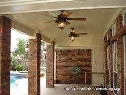 Tuscan columns & brick porch inspiration for a large timeless brick front porch remodel in new orleans with a roof extension like the brick color. Replace Wrought Iron With Brick Columns On Front Porch Brick Columns Columns On Front Porch Patio Columns