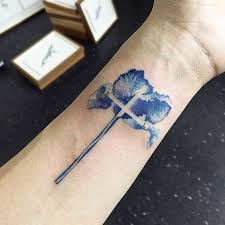 Cross with flowers inside tattoo. Cross Tattoos For Women Ideas And Designs For Girls