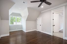 Grey laminate flooring can help you crete a bold yet stylish statement and will make a stunning backdrop to any interior. Dark Wood Floors Light Grey Walls White Trim And Dark Matte Fixtures We Love This Combo Goodwin Foust Grey Walls White Trim Light Grey Walls Grey Walls