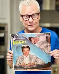 If YOU ever smiled at this showman's flashy wardrobe you might be OVER THE  HILL. 😁