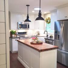 A popular choice for small spaces, as it can be rolled away when not in use. 20 Recommended Small Kitchen Island Ideas On A Budget Kitchen Design Small Modern Kitchen Small Modern Kitchens