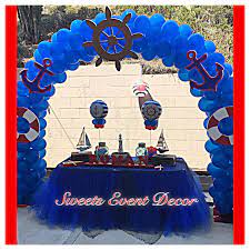 Sailor dessert table with candies and cupcakes. Nautical Theme Balloon Decoration By Sweets Event Decor Event Decor Balloon Decorations Nautical Theme