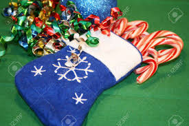 Christmas stocking filled with teddy bear and candy canes. Small Christmas Stocking Filled With Candy Canes Stock Photo Picture And Royalty Free Image Image 9881534