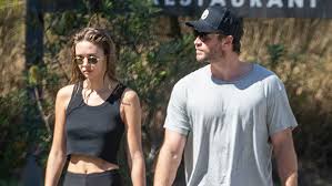 The pair were all smiles before being snapped in the sand in photos published. Liam Hemsworth Girlfriend Gabriella Brooks Hike In Australia Pic Hollywood Life