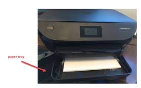 Slide the paper width guide to its outermost position. How Do I Put Paper Into My Printer