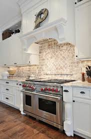 A brick backsplash is easy to install and isn't too expensive. Interior Design Ideas Home Bunch An Interior Design Luxury Homes Blog Kitchen Backsplash Designs Brick Kitchen Brick Backsplash Kitchen