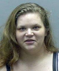 Woman accused of using counterfeit money