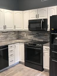 kitchens with black appliances idea