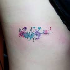 If Mir And I Got These Maybe But With The Word Sisters Instead Of Faith I Like The Heartbeat And The Watercolor Backgro Cute Tattoos Tiny Tattoos Word Tattoos