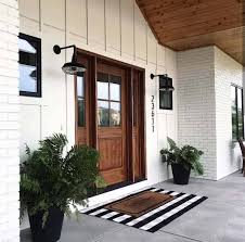 30 Gorgeous And Inviting Farmhouse Style Porch Decorating Ideas Brick Exterior House House Exterior Modern Farmhouse Exterior