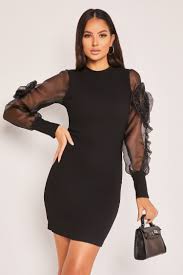Encolure élégante manches bouffantes avec poignets élastiques coupe près du corps coupe courte robe de soirée mini sequins avec manches bouffantes. Robe Noire A Manches Bouffantes A Fleurs Brentiny Paris