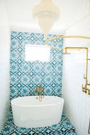Blue Tiled Accent Wall Flows Onto Floor Open Shower Tub Wet Room With Optional Shower Curtain Patterned Bathroom Tiles Blue Bathroom Tile Bathroom Interior
