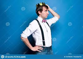 Man With Dark Hair In Pink Shirt Bow Tie And Black Suspender Holding Hand On Hip Correcting Gold Shiny Crown Stock Photo Image Of Sleeves Confident 154700348