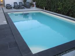The Fastlane Makes An Existing Backyard Pool More Functional With Counter Current Swimming Endless Pool Backyard Pool Landscaping Pool