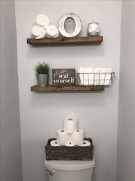 Half Bathroom Decor Wood Shelves And Toilet Paper In A Basket Farmhouse Bathroom Remodel Id Half Bathroom Decor Beautiful Bathroom Designs Half Bath Decor