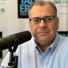 Which radio station vans were seen in the Millcreek or Lawrence Park  parades?