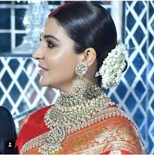 Makeup Jewellery Hair Of Anushka Sharma For Her Wedding Reception Sabyasachi Virushka Bollywood Wedding Bridal Jewellery Indian Indian Wedding Hairstyles Check out anushka sharma's hairstyle during her instead of opting for a very high bun — which is what most brides to add volume, hairstylist georgiou gabriel opted for a bun that rested right on the.