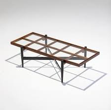 The first element you'll want to consider is the construction material of your coffee table. 1950s Lattice Construction Coffee Table 106805