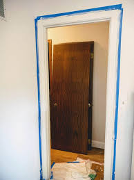 Thanks to these two, i can't paint my doors black because we need to install a cat flap into one of the dining room doors that goes into the cellar, as this is where their food and litter tray live. How To Paint Beautiful White Trim From A Professional Painter A Well Purposed Woman