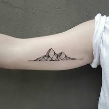 Tiny Tattoos Are All The Rage Right Now Geometric Mountain Tattoo Tattoos Mountain Tattoo