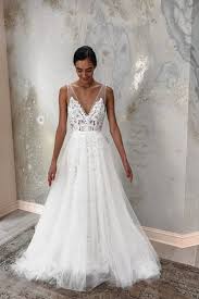 Wedding dresses with long trains. Untamed Petals X Lovely Bride Overskirts Lovely Bride