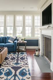 Lowes square area rugs home inspirations. Baroque Nourison Rugs In Living Room Traditional With Dark Wood Coffee Table Next To Leopard Carpet Alongside Distressed Wood Media Console And Corner Media Console
