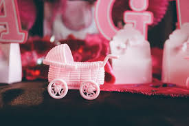 Maybe you would like to learn more about one of these? Hd Wallpaper White Stroller Figurine On Brown Pavement Baby Girl Baby Shower Wallpaper Flare