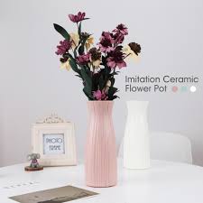 This artificial floral centerpiece consists of silk white flowers drowned in clear water, inside of a beautifully shaped vase designed of clear glass. Buy 1 Pc Flower Vase Decoration Home Plastic Vase White Imitation Ceramic Flower Pot Flower Basket Nordic Decoration Flowers Vases At Affordable Prices Price 21 Usd Free Shipping Real Reviews With Photos Joom