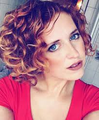 Razor cut hairstyle for short pixie with undercut. 111 Amazing Short Curly Hairstyles For Women To Try