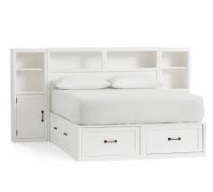 Even the bedside shelves are built into the headboard. Stratton Storage Bed Headboard Pottery Barn